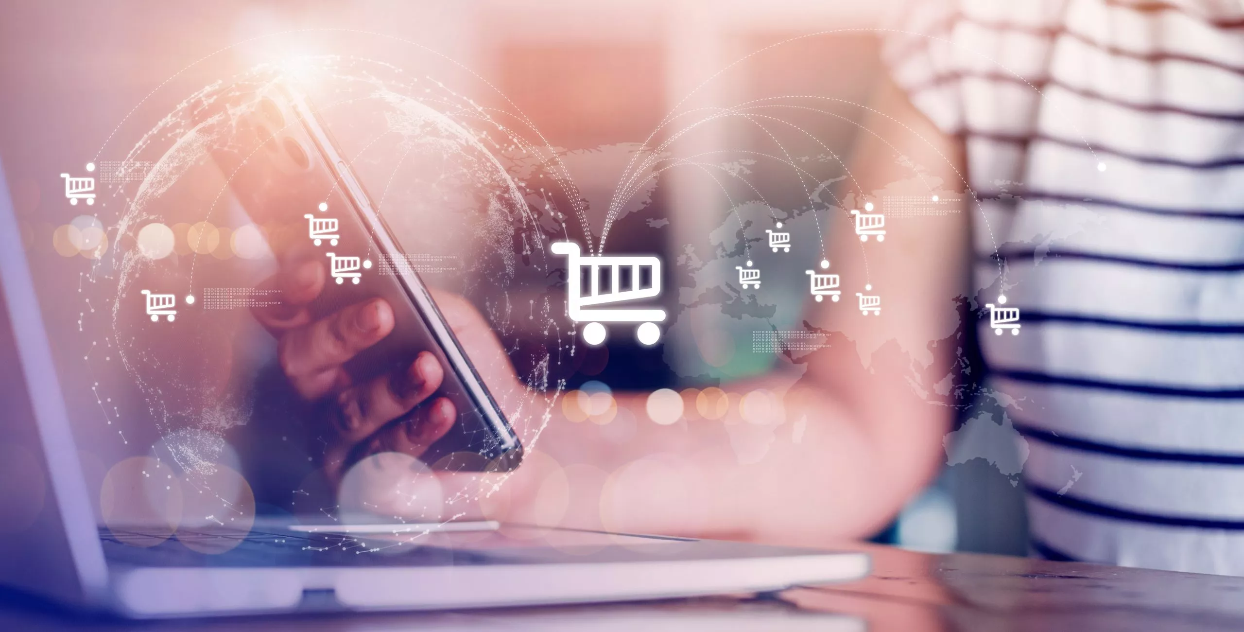 Businessman, woman using a smartphone, laptop to shop online Connect big data on the internet network to the world technology borderless shopping cart symbol